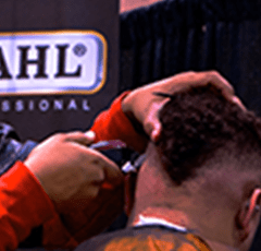 wahl professional barber shaving the side of a man's head